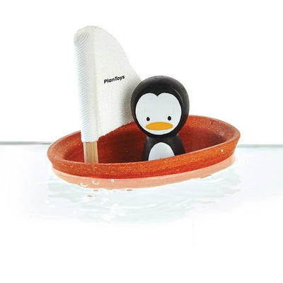 PLAN TOYS - Sailing boat penguin - Wooden toy