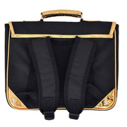 Your child will be able to go to school as a true superhero thanks to this black satchel from Caramel & Cie and its great golden mask pattern!