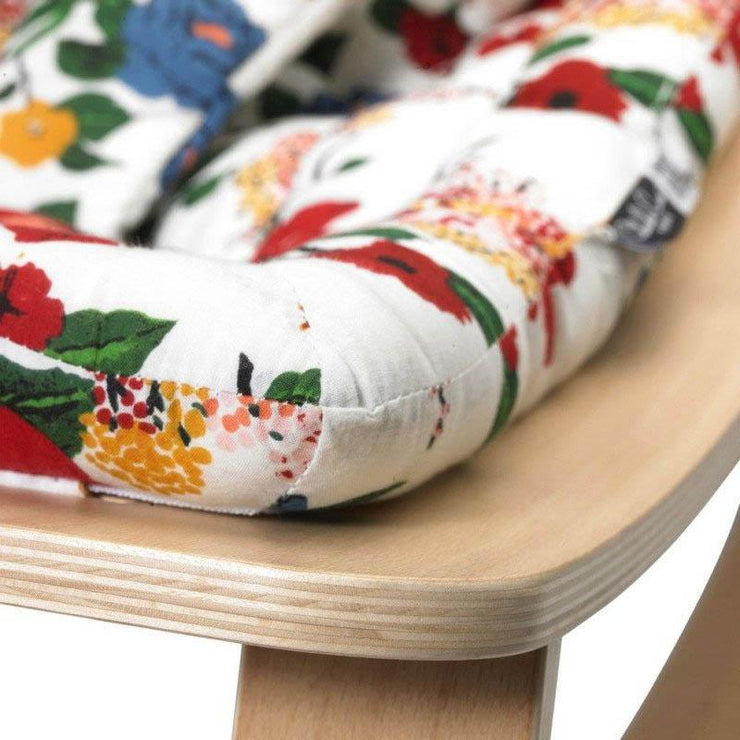 This adorable baby rocker from Charlie Crane will let you keep your little one close while still being comfortably settled. We love its original pattern!