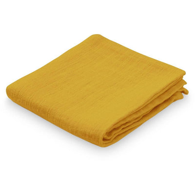 Created by Cam Cam Copenhagen, this diaper is made from 100% organic cotton. We love its softness and nice mustard color. A must-have for baby